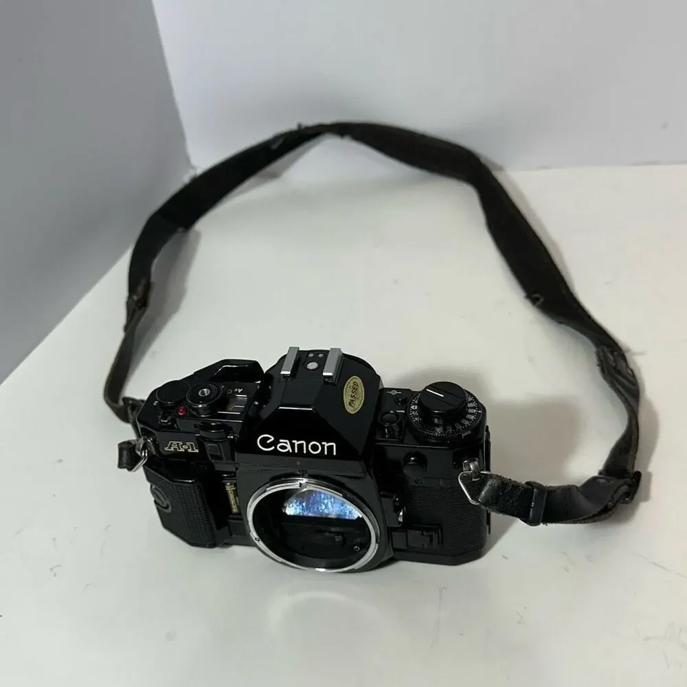Vintage Canon A-1 Black 35 mm SLR with Strap/ Body Only